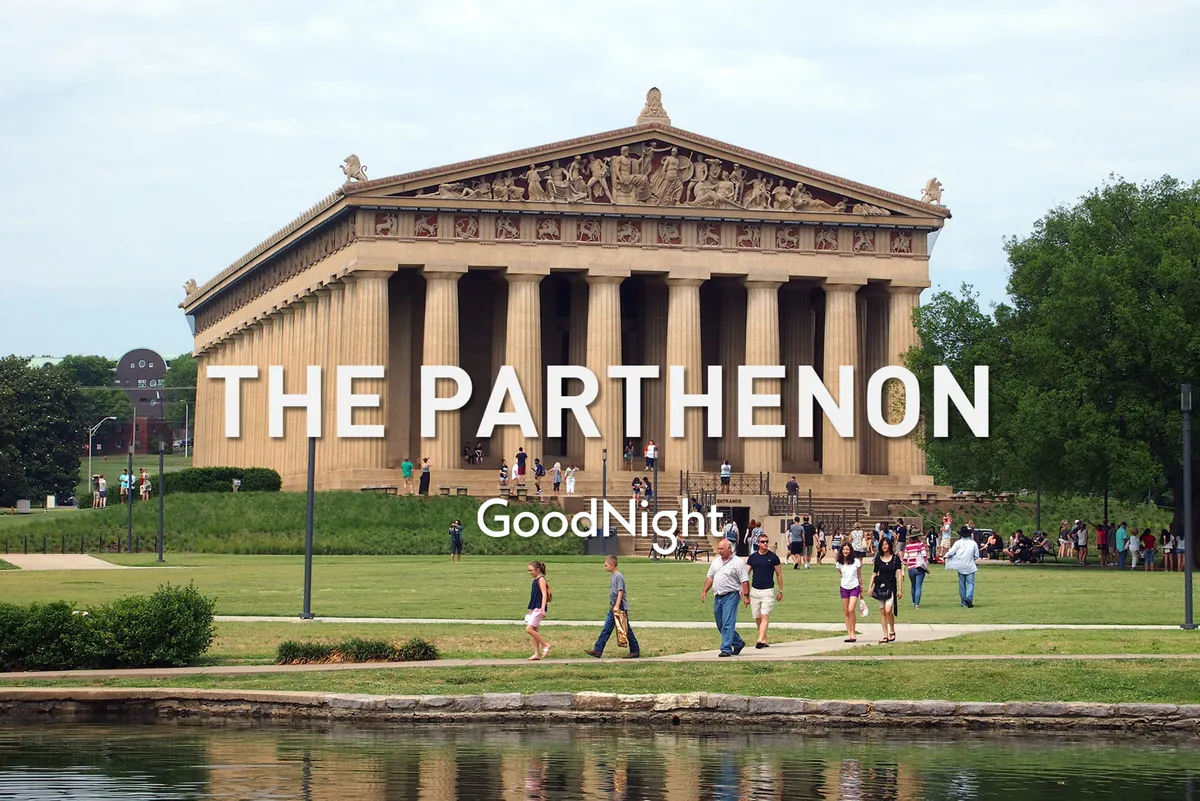 This exterior shot features the iconic Parthenon in Centennial Park, surrounded by a lush green lawn with visitors strolling and engaging in sightseeing. The image emphasizes the unique blend of cultural heritage and outdoor leisure that defines Nashville’s West End.