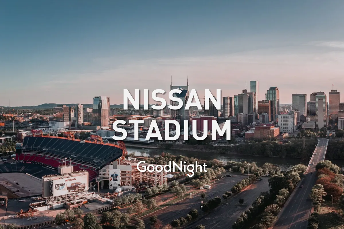 This image features the vibrant Nissan Stadium, the Nashville city skyline, and the river in the foreground. The scene is bustling with energy, evoking the excitement of attending live events such as concerts and football games while offering a glimpse of the city's nightlife and iconic downtown.